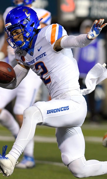 No. 20 Boise State runs over Utah State for 56-21 win